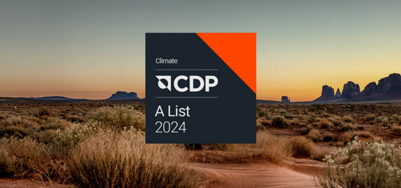 CDP Climate A List 2024 badge over a desert landscape at sunset.